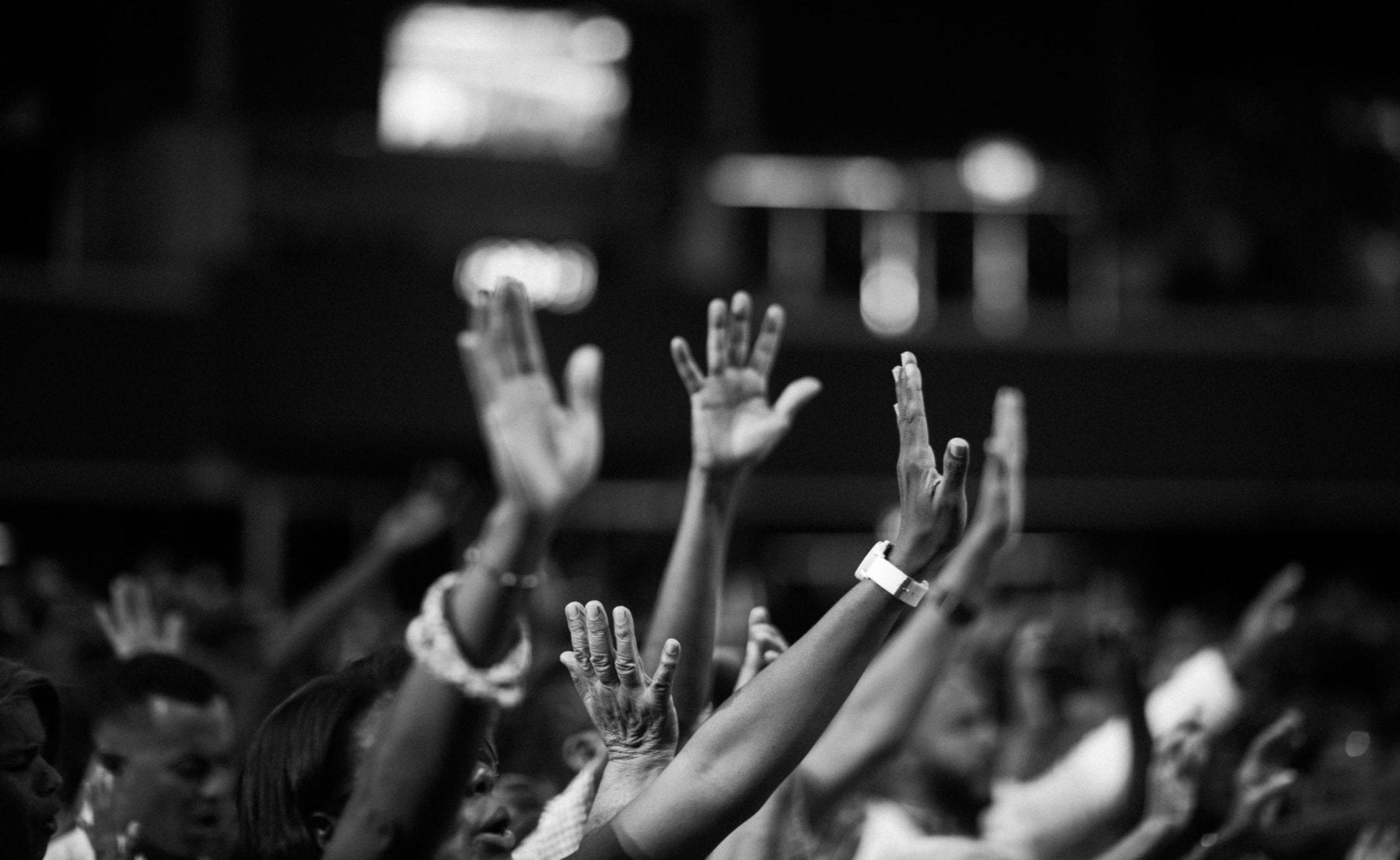 People raising hands image