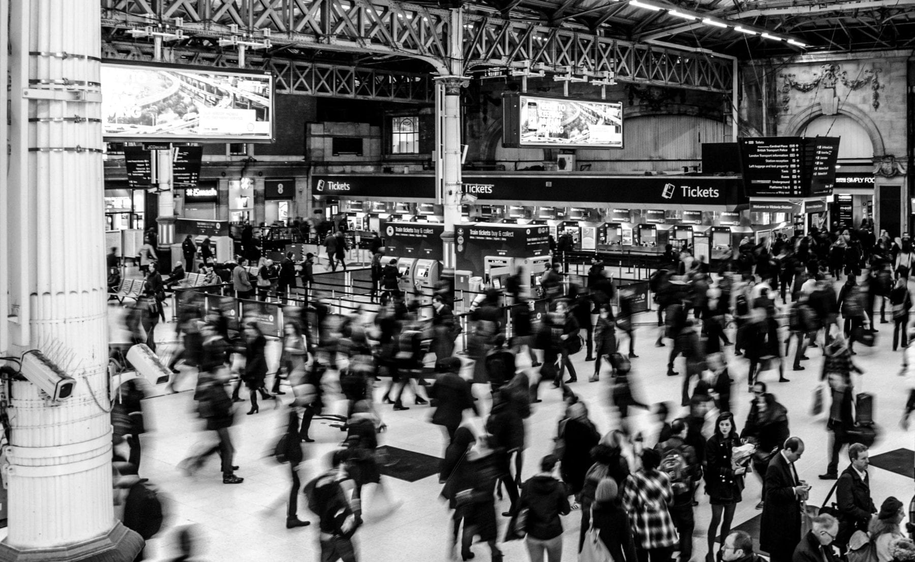 People walking in train station